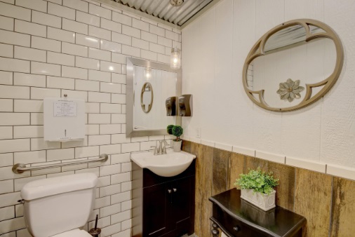 Handicap-accessible bathroom with subway tile