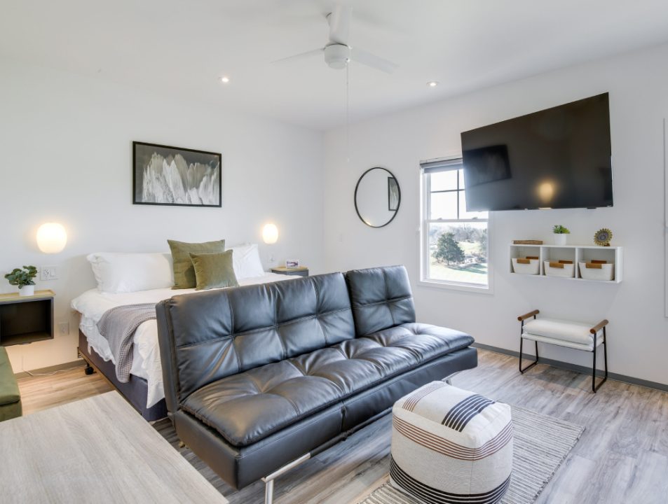 A king suite in the Cedar Pond Farms barndominium, set up for a couples weekend getaway near Knoxville, Tennessee.