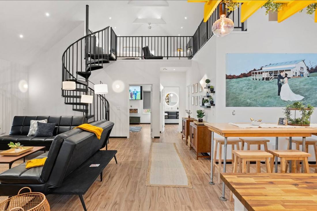 The bright modern living space of a Barndo B suite at Cedar Pond Farms, a farm stay near River Glen Equestrian Park