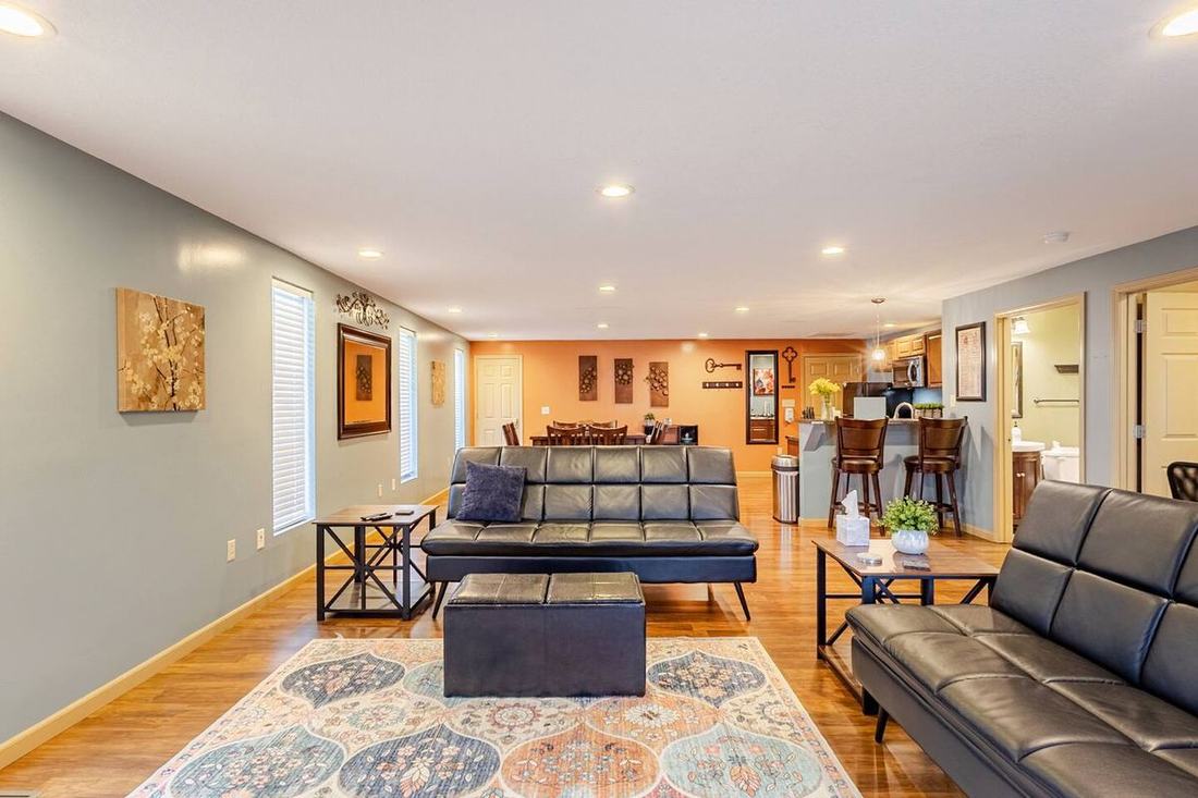 Spread out across the open living and dining room of Executive Apartment B, minutes from the fluffy cow farm just outside the Smoky Mountains.