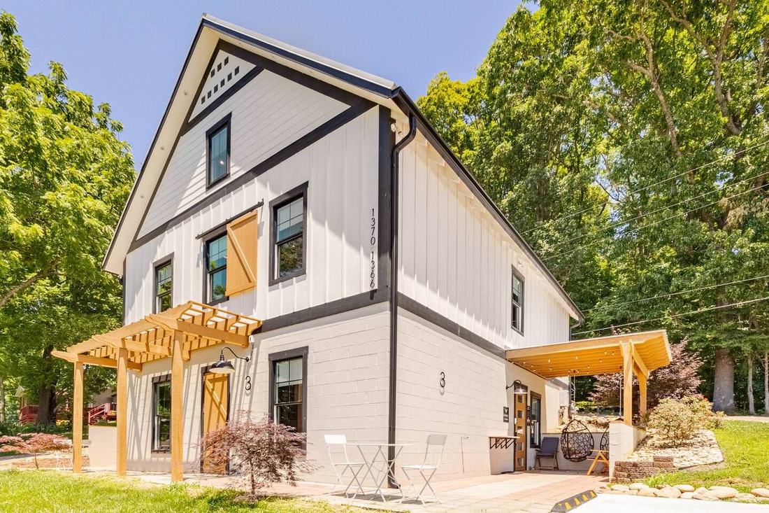 Take the entire Barndo 3, with pergola-shaded patios on both sides, at the fluffy cow farm just outside the Smoky Mountains.