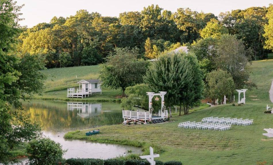 Aerial view of ceremony sites along the pond at Cedar Pond Farms