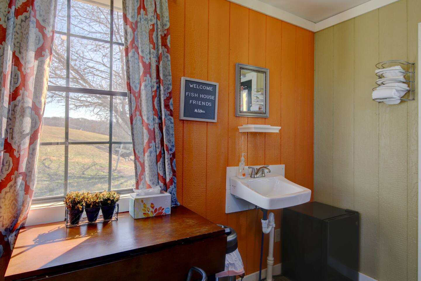 Inside FishHouse Tiny Home, a lakeside tiny home at Cedar Pond Farms — our fluffy Highland cow farm just outside the Smoky Mountains.