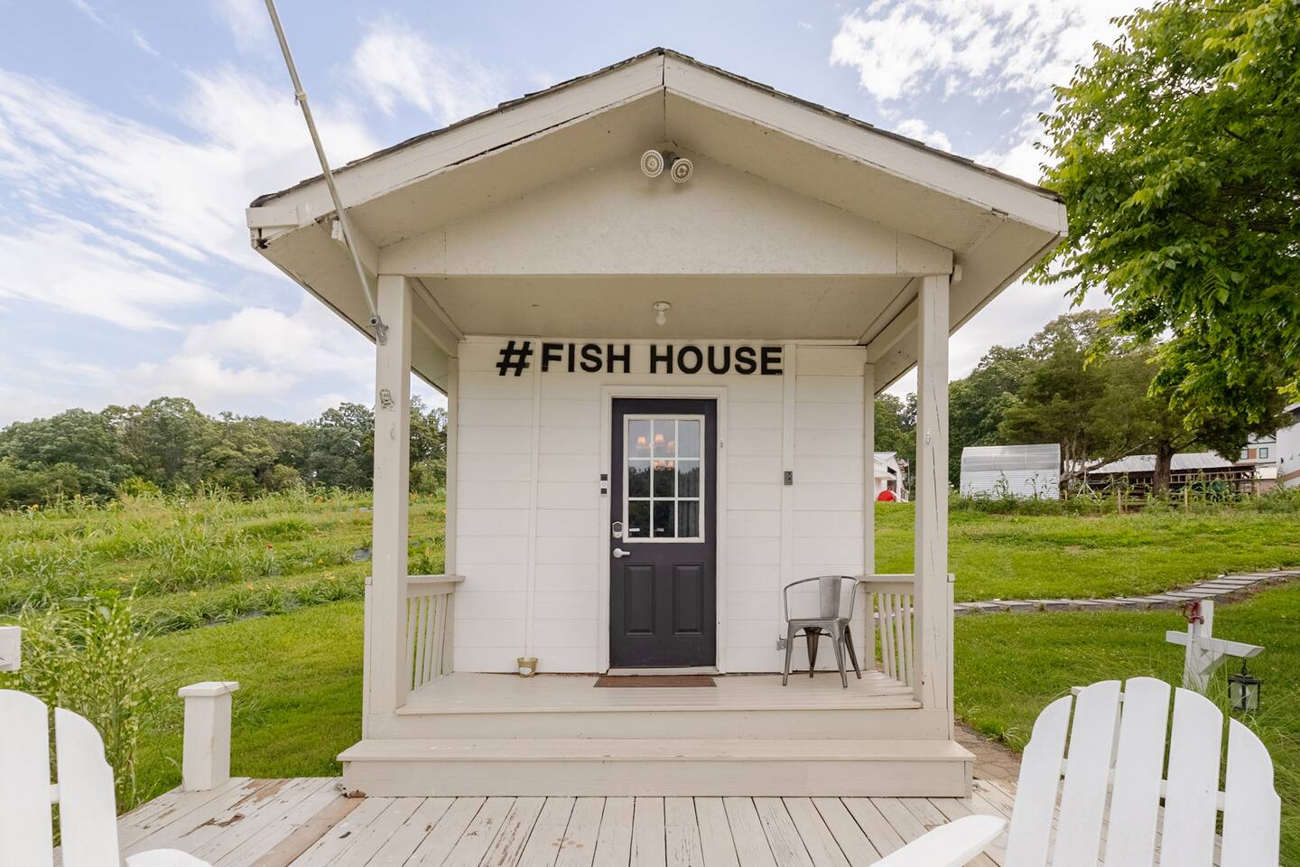 Inside FishHouse Tiny Home, a lakeside tiny home at Cedar Pond Farms — our fluffy Highland cow farm just outside the Smoky Mountains.