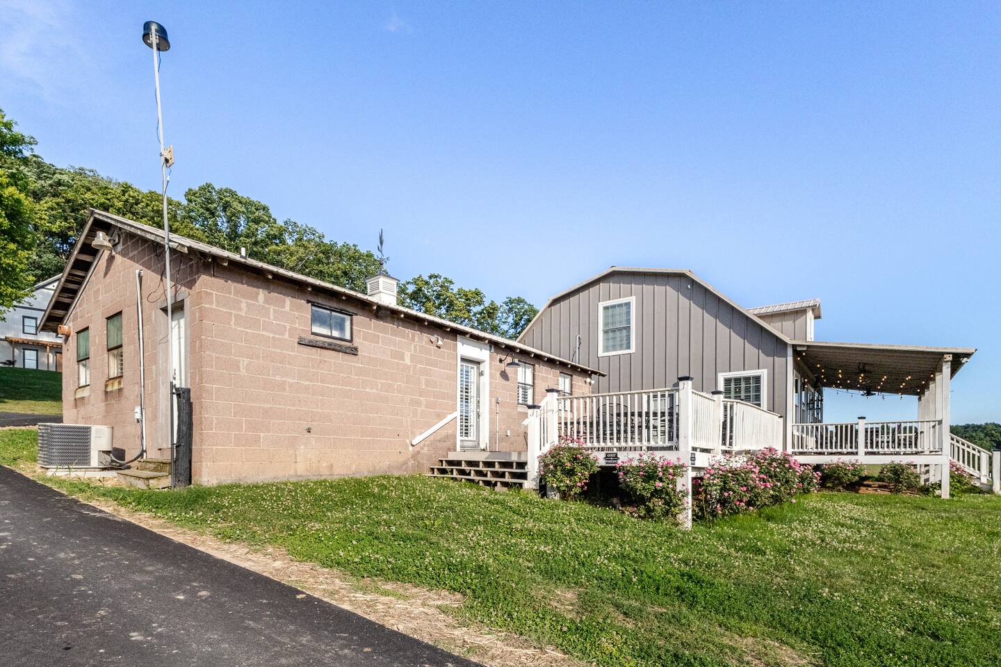 Milkbarn Farm Stay at Cedar Pond Farms — converted milk barn farmhouse lodging on the farm, with the Highland herd a short walk away.