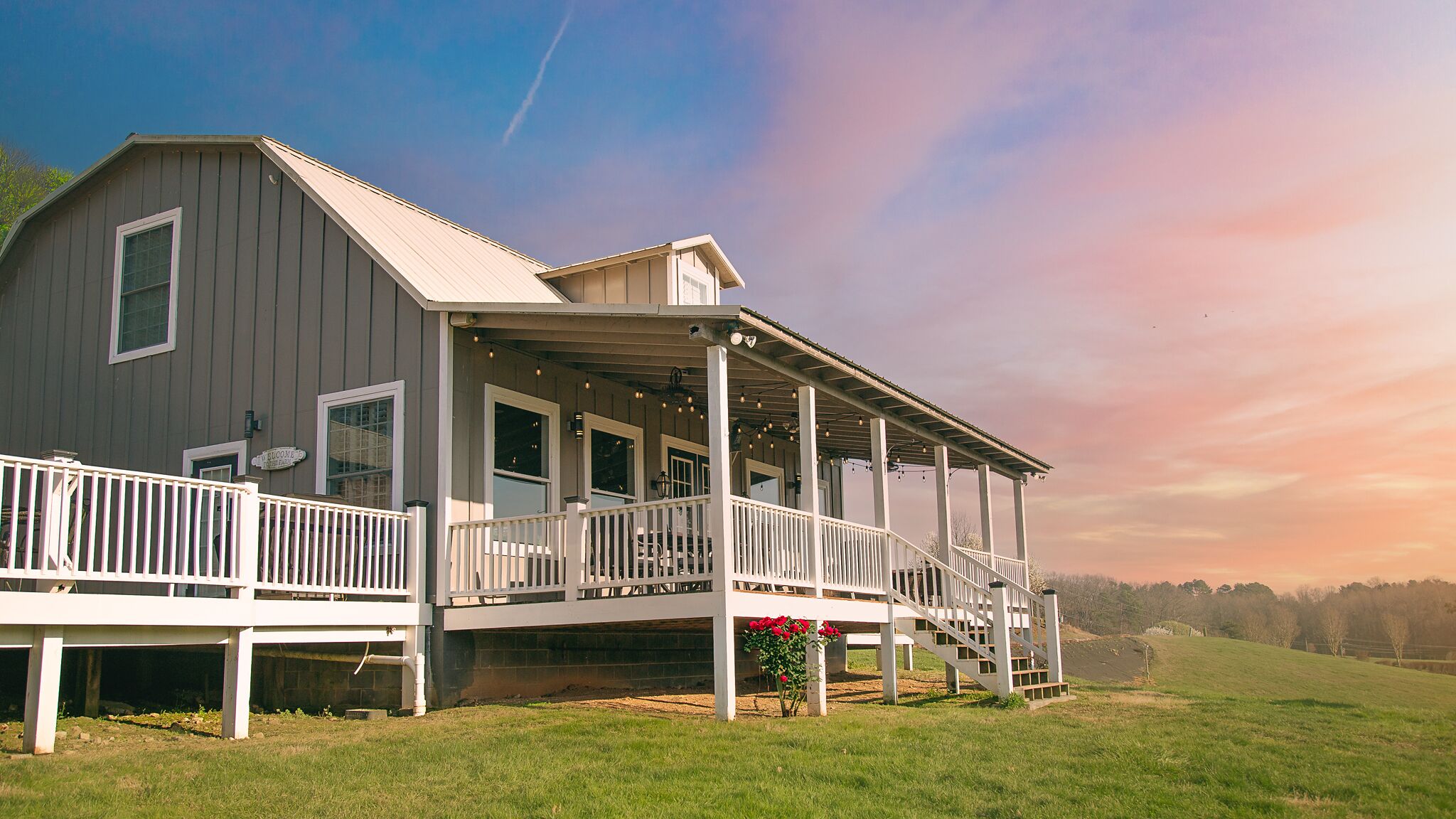 Inside Milkbarn Farm Stay, a converted milk barn farmhouse at Cedar Pond Farms — our fluffy Highland cow farm just outside the Smoky Mountains.